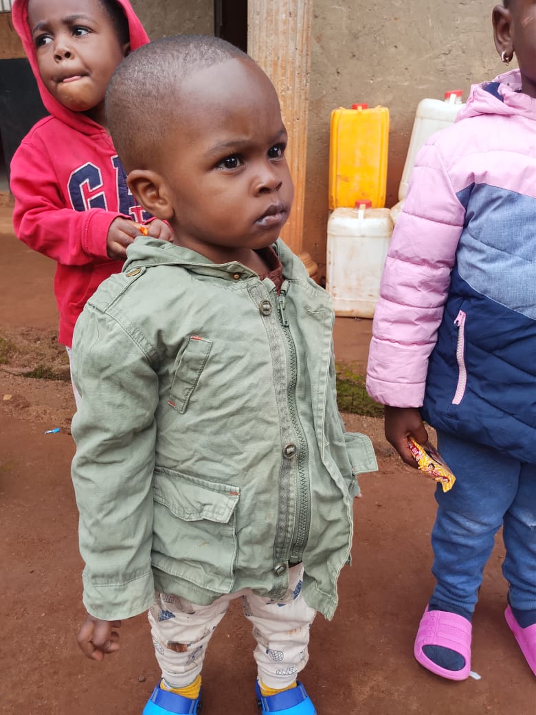 Enfant lors d'une action solidaire du Bon Refuge
